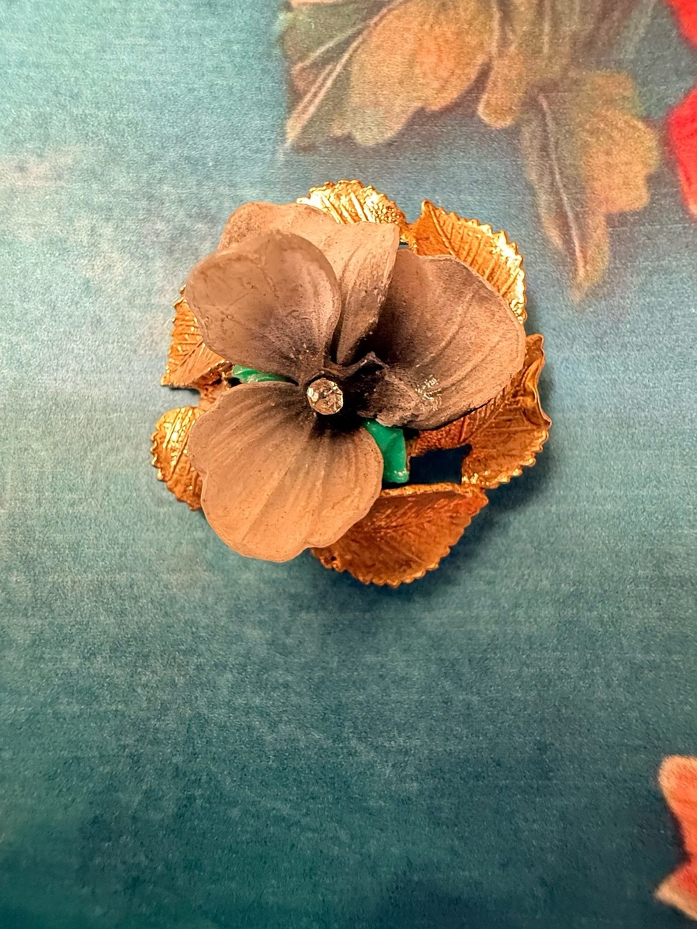 Small Gold-Tone Floral Brooch with Gray Petal Accent